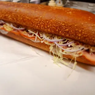 OUR BAKED ITALIAN SUBS