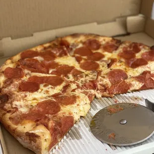 a pepperoni pizza in a box