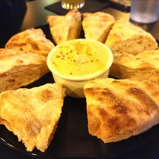 a plate of bread and dip