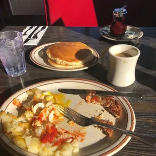 Eggs, sausage,potatoes, pancakes and coffee