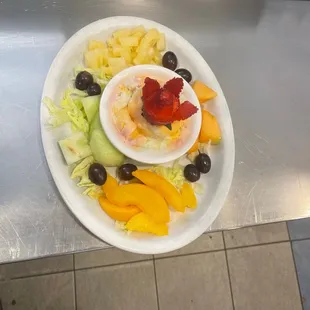 a plate of fruit and vegetables