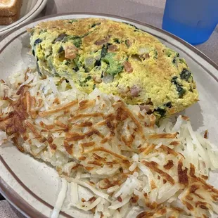 Incredible Omelette with hash browns and toast