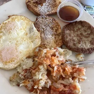 French toast, sausage patties, over medium eggs, hash browns