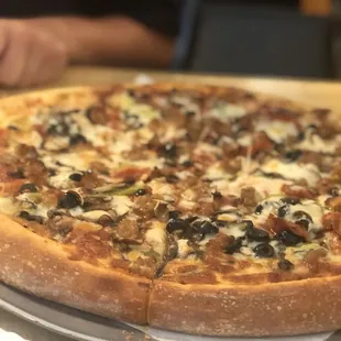 a whole pizza on a pan