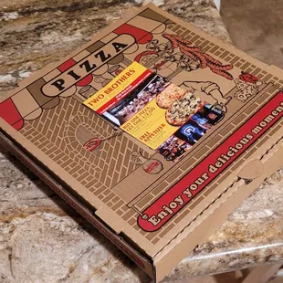 Bring home box of leftover pizza...notice coupon.