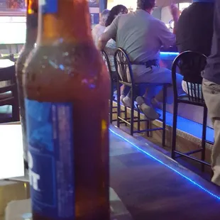 people sitting at a bar