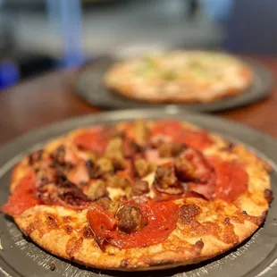 Meat filled NYC style pizza.