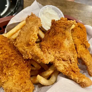Fried tilapia with cajun fries