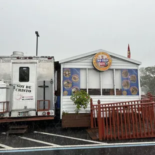 a truck and trailer in a parking lot