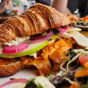 Carrot lox and apple croissant sandwich