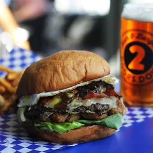 a burger and fries on a table