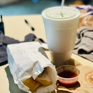 Two Empanadas filled with Nutella with strawberry dipping sauce! Mango Pineapple slush!