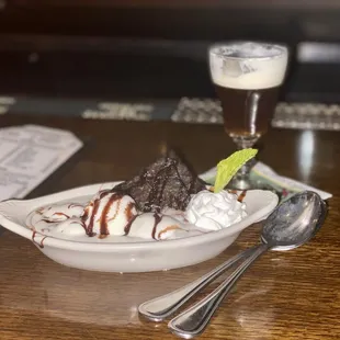a dessert with ice cream and chocolate sauce
