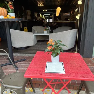 a red table and chairs