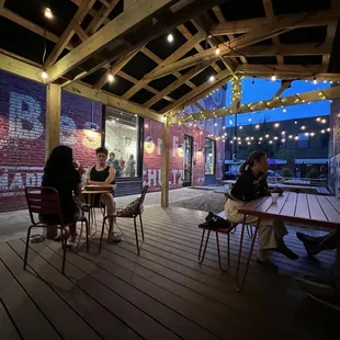 a group of people sitting at a table