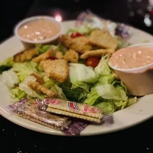 instead of 2 sides, hubby got double salad. Comes on a dinner plate with 2 dressings. YUGE! :)...