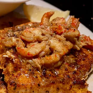 LOVE! blackened salmon with Voo Doo sauce.  (on menu/add "blackened" &amp; top w Voo Doo sauce)