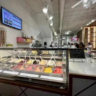 a cafeteria with a variety of desserts
