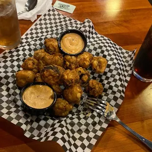 Mushroom appetizer with spicy dipping sauce the tempura batter was fantastic had a great flavor to them
