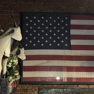 Goats and Flag above the door