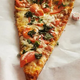 Monster-sized pizza slice