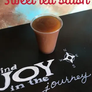 a cup of coffee on a table