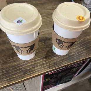 two cups of coffee on a table