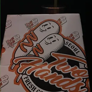 a box of fresh corn dogs
