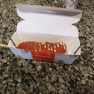 Two hands hot dog
