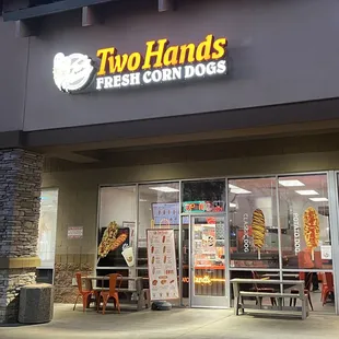 Front of Two Hands Corn Dogs