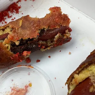 One of the corn dogs that were burnt and re-dipped