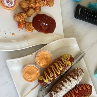 Spixy tots and 3 corn dogs.