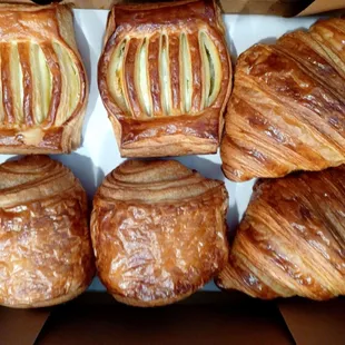 Chocolate croissant bottom left, Dulce de leche on the top left. Regular croissants to your right