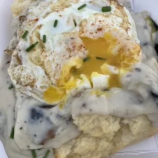 Biscuits and Gravy half-size with runny egg yolk