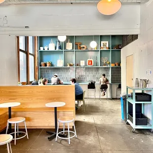 two people sitting at tables