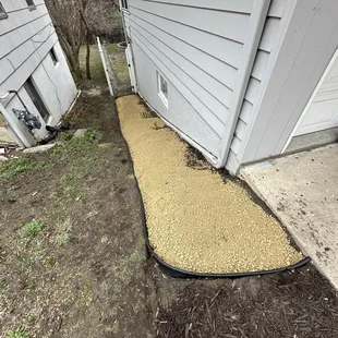 Down hill path removal. Border mulch design.