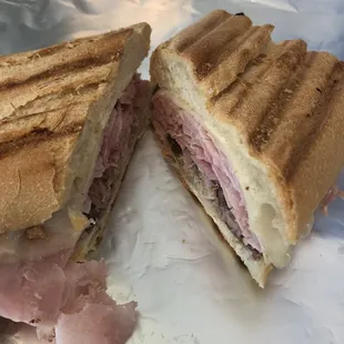Pressed Cuban Sandwich. Comes with a bag of chips &amp; pickle spear