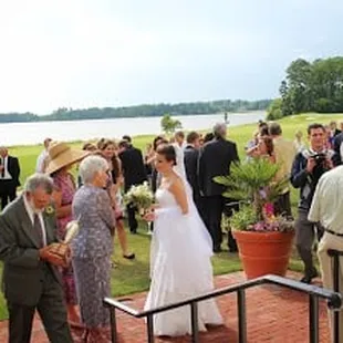 Out door patio and lawn are easily accessible from cocktail room and reception room