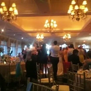 dance floor is situated in the middle of the beautiful room, all we added were center pieces!