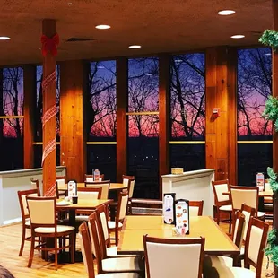 a view of the sunset through the windows