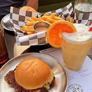 Smash burgers, fries and creamsicle cocktail