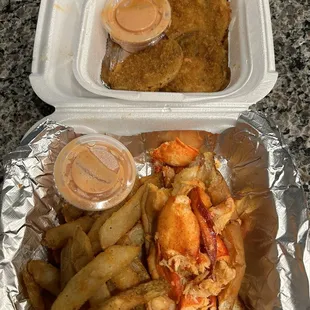 Lobster roll, fries, and fried green tomatoes.