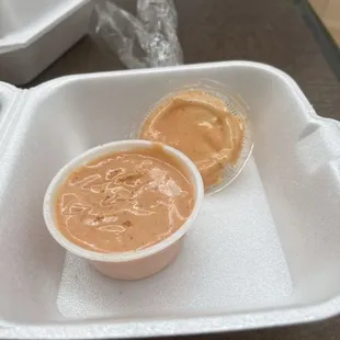 a picture of two containers of food