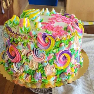 Spectacular 10" 3-layered marble birthday cake with buttercreme frosting.