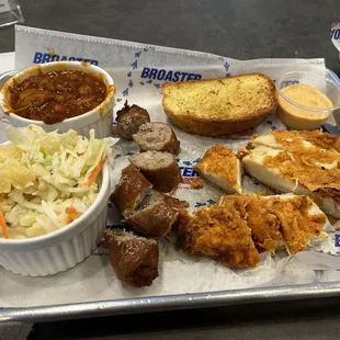 TWO item meal: broast spicy chicken and sausage. SIDES: pork &amp; beans YUM and slaw YUMMY!