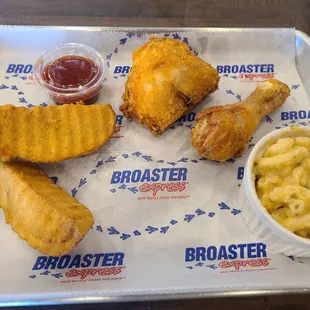 Two piece spicy, dark,  with potato wedges and jalapeno mac and cheese
