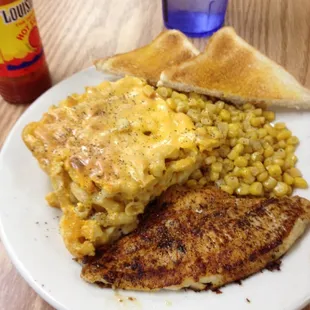 I ate it all and it was just as delicious as it looks! Grilled fish, Mac and cheese, and corn!