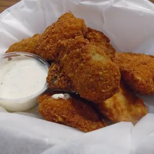 Jalapeno poppers with dipping sauce.
