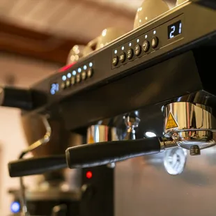 a close up of a coffee machine