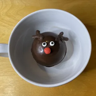 Little Reindeer cocoa bomb before meeting his maker in hot steaming milk. Does he look a little concerned?